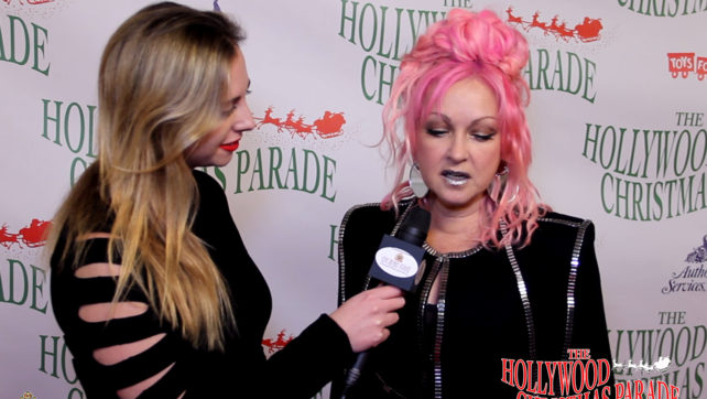 Galassia Grassetto interviews celebrities at Hollywood Christmas Parade